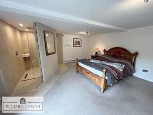 Bedroom One- click for photo gallery